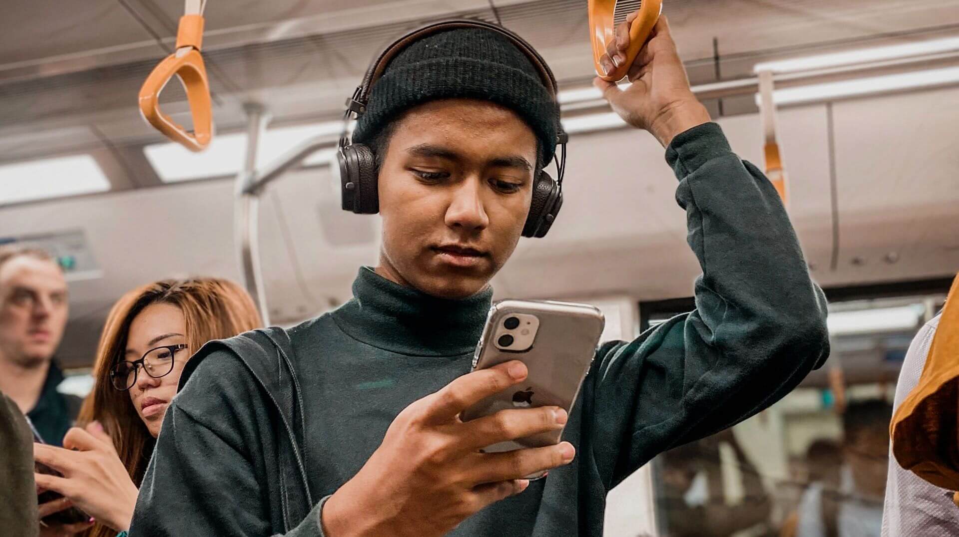 guy with a cellphone in metro